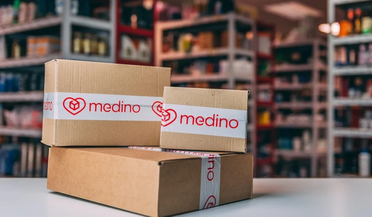 Medino-branded cardboard boxes in a pharmacy setting